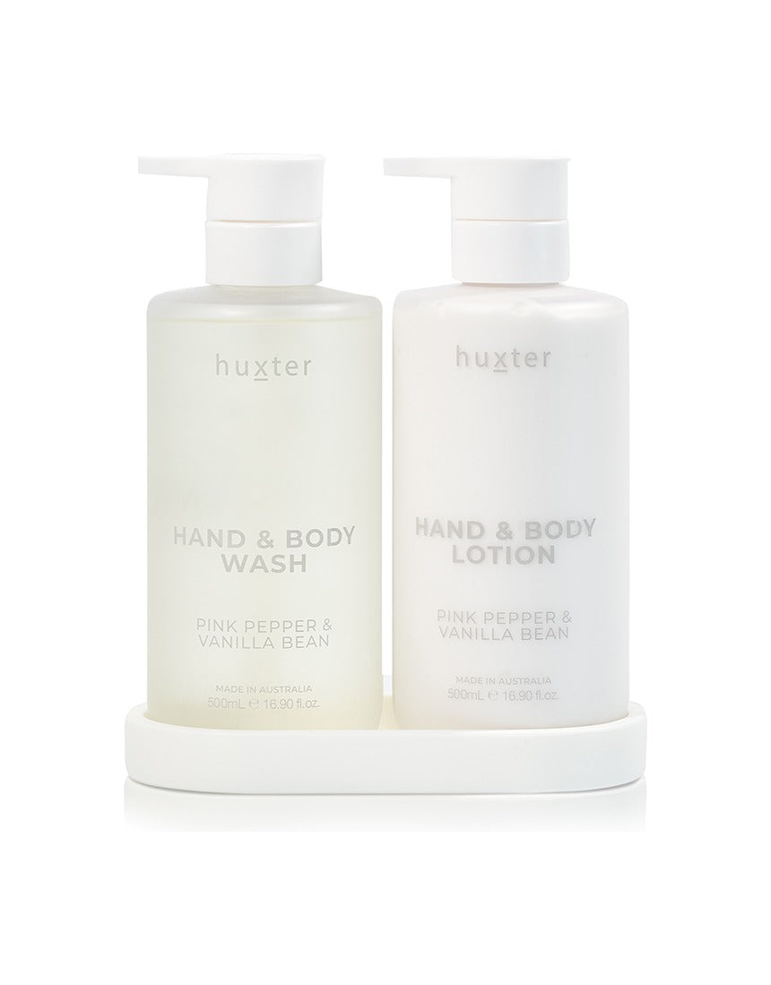 Huxter Pink Pepper and Vanilla Bean wash and lotion on white tray