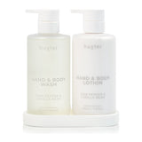 Huxter Pink Pepper and Vanilla Bean wash and lotion on white tray