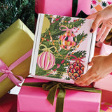 Huxter Christmas Wash and Lotion Gift Set styled with colourful gifts