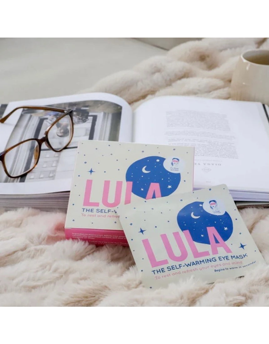 Lula self-warming eye mask in rose color, shown with five masks in soft fabric for relaxing eye comfort and warmth.