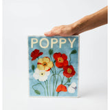 Jones & Co Market Wall Art featuring vibrant poppy floral design on a decorative wall art piece.