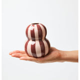 Jones & Co Fonda Vase in burgundy pink stripe with a sleek, modern design and glossy finish.