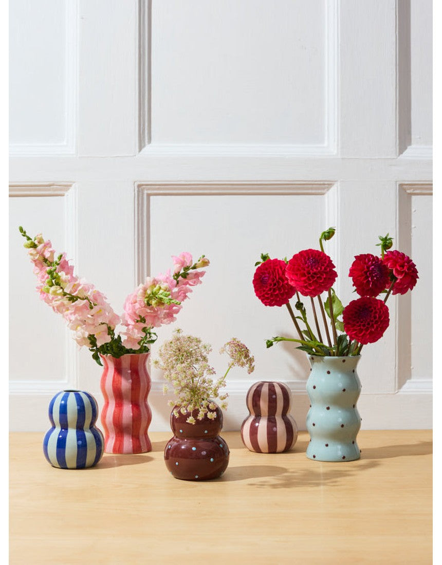 Jones & Co Fonda Vase in Burgundy Pink Stripe with a sleek, modern design and vibrant striped pattern.