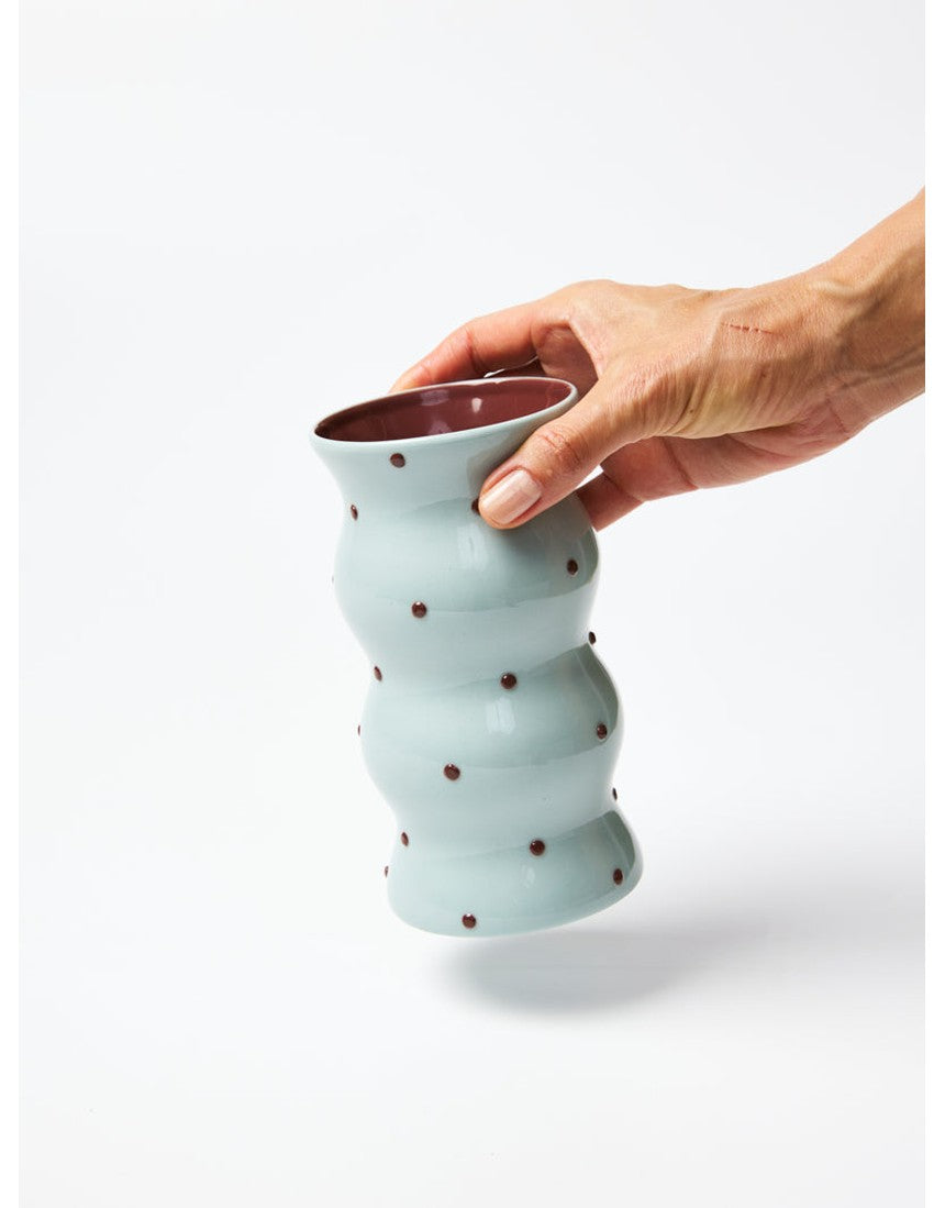 Jones & Co Palma Vase in blue and brown with a dotty pattern, showcasing its stylish ceramic design and vibrant colors.