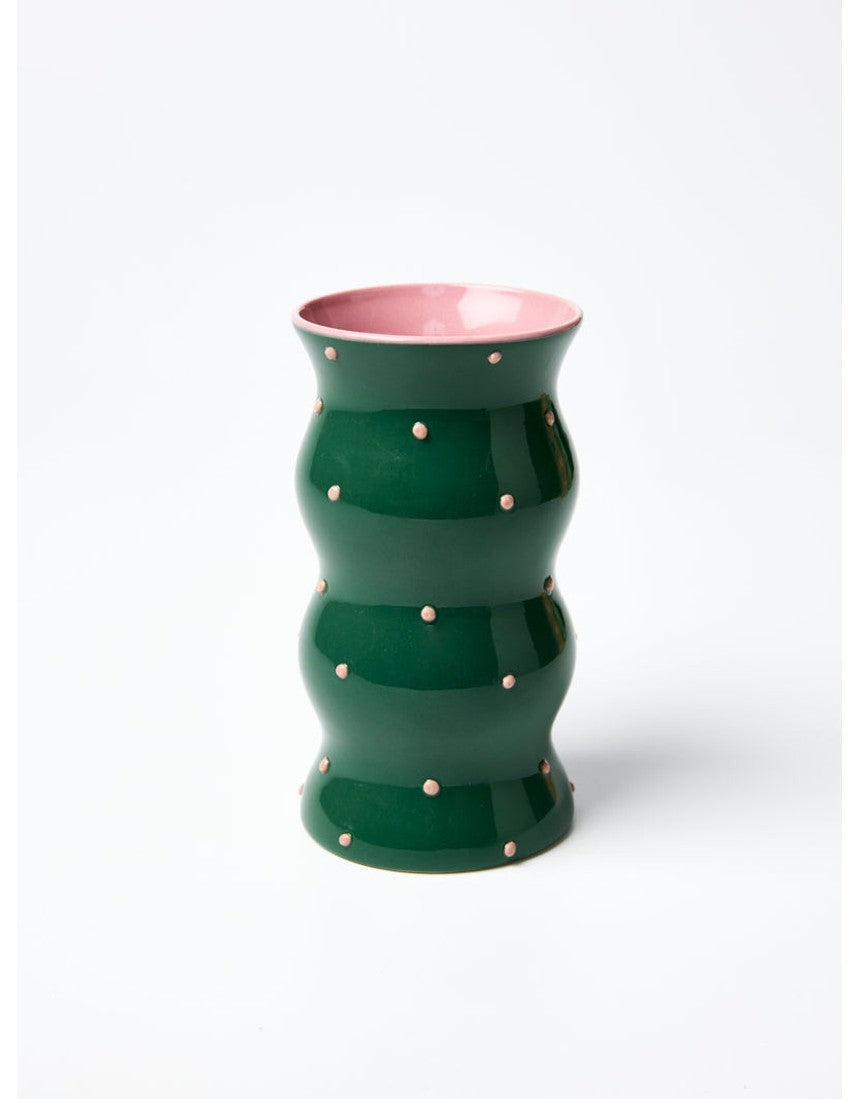Jones & Co Palma Vase in green with pink dotty pattern, featuring a sleek, modern design perfect for floral arrangements.