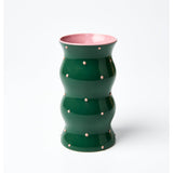Jones & Co Palma Vase in green with pink dotty pattern, featuring a sleek, modern design perfect for floral arrangements.