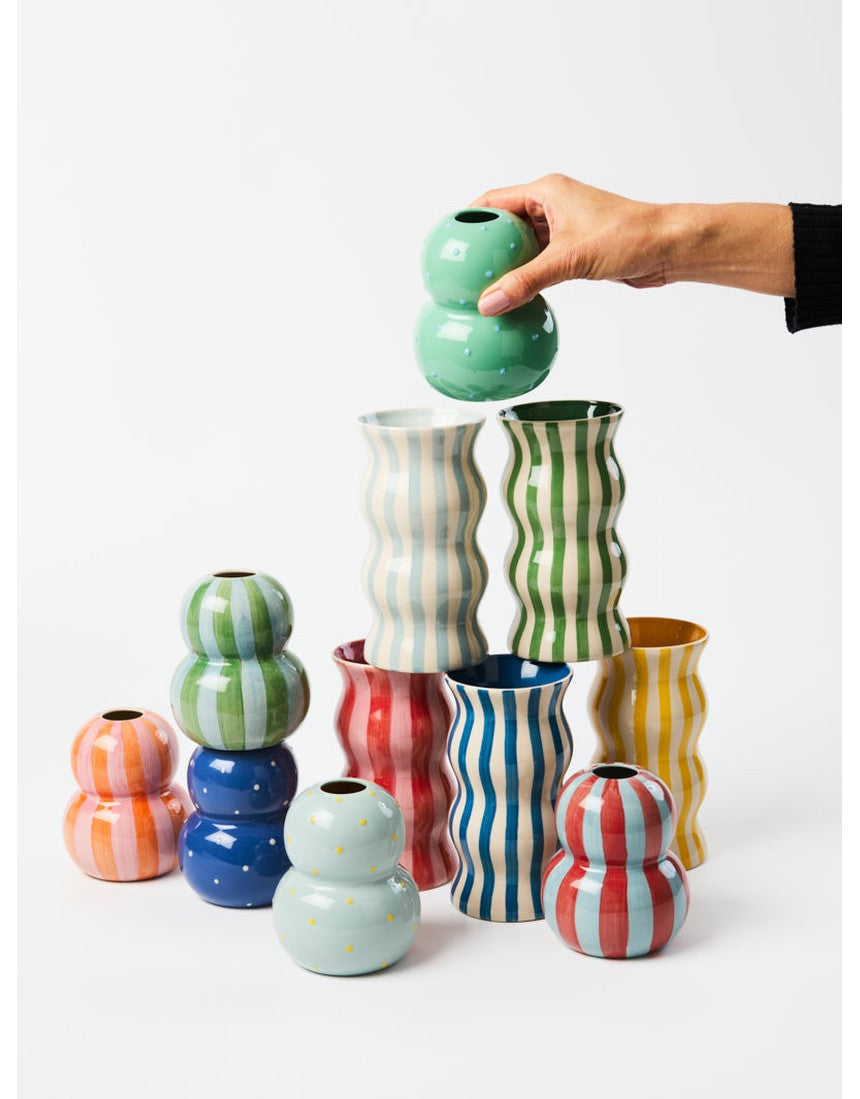Jones & Co Palma Vase in red and pink stripe pattern, showcasing a stylish ceramic vase with colorful striped design.