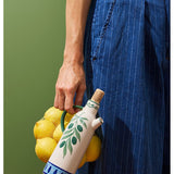 Jones & Co Piccolo Vita Oil Pourer, a sleek glass tableware oil dispenser with a stainless steel spout for easy pouring.