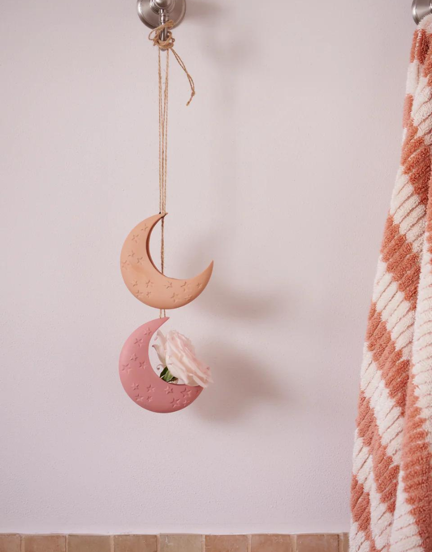 Pink Luna hanging vase by Jones & Co, featuring a modern ceramic design with a hanging loop for decorative floral displays.