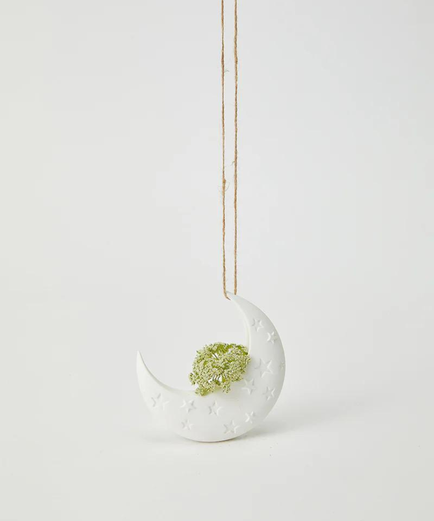 White Luna hanging vase by Jones & Co, featuring a sleek ceramic design perfect for wall decor or floral arrangements.
