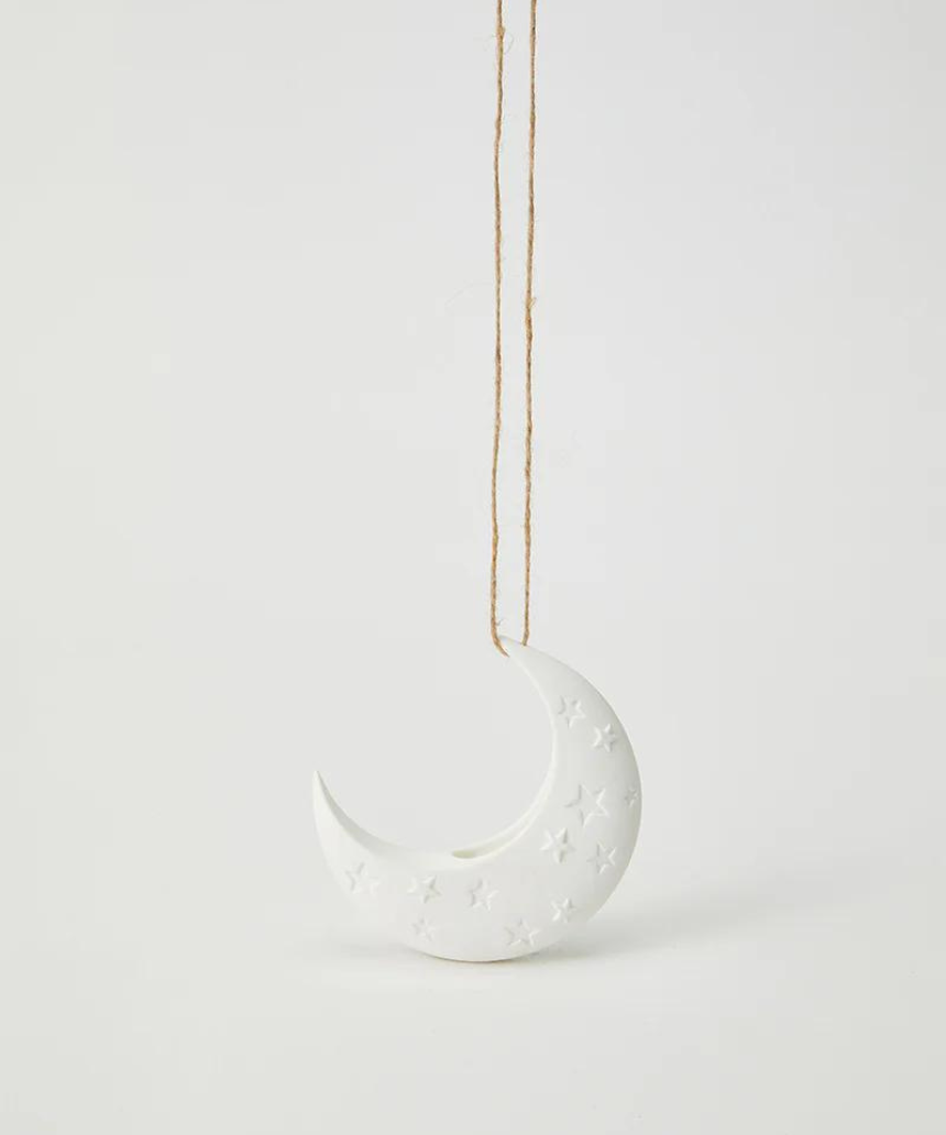 White Luna hanging vase by Jones & Co, showcasing a sleek, modern design with a smooth surface and hanging loop.