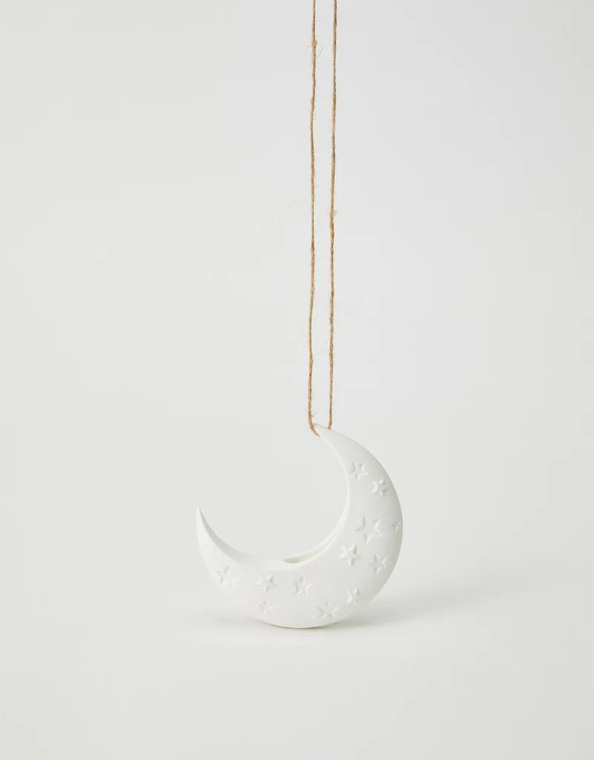White Luna hanging vase by Jones & Co, showcasing a sleek, modern design with a smooth surface and hanging loop.
