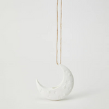 White Luna hanging vase by Jones & Co, showcasing a sleek, modern design with a smooth surface and hanging loop.
