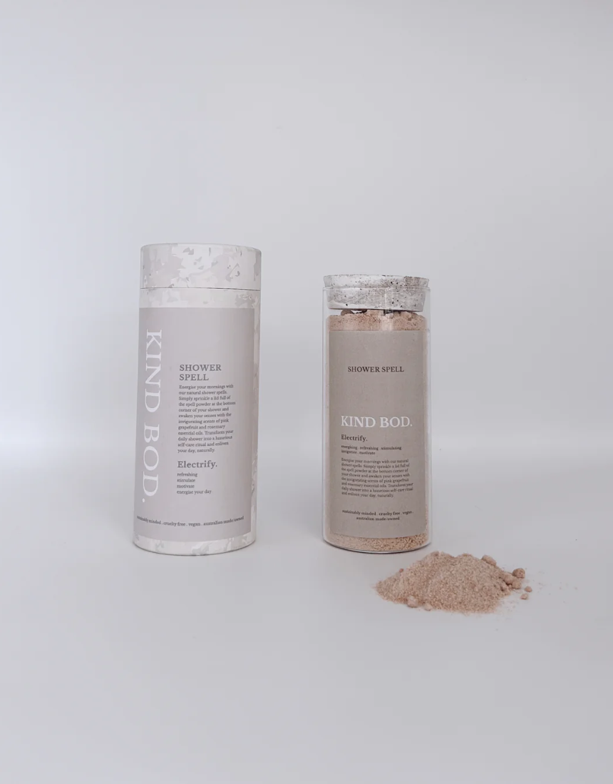 Kind Bod Spell Jar shower bomb in a clear container with natural ingredients, designed for a relaxing, aromatic shower experience.