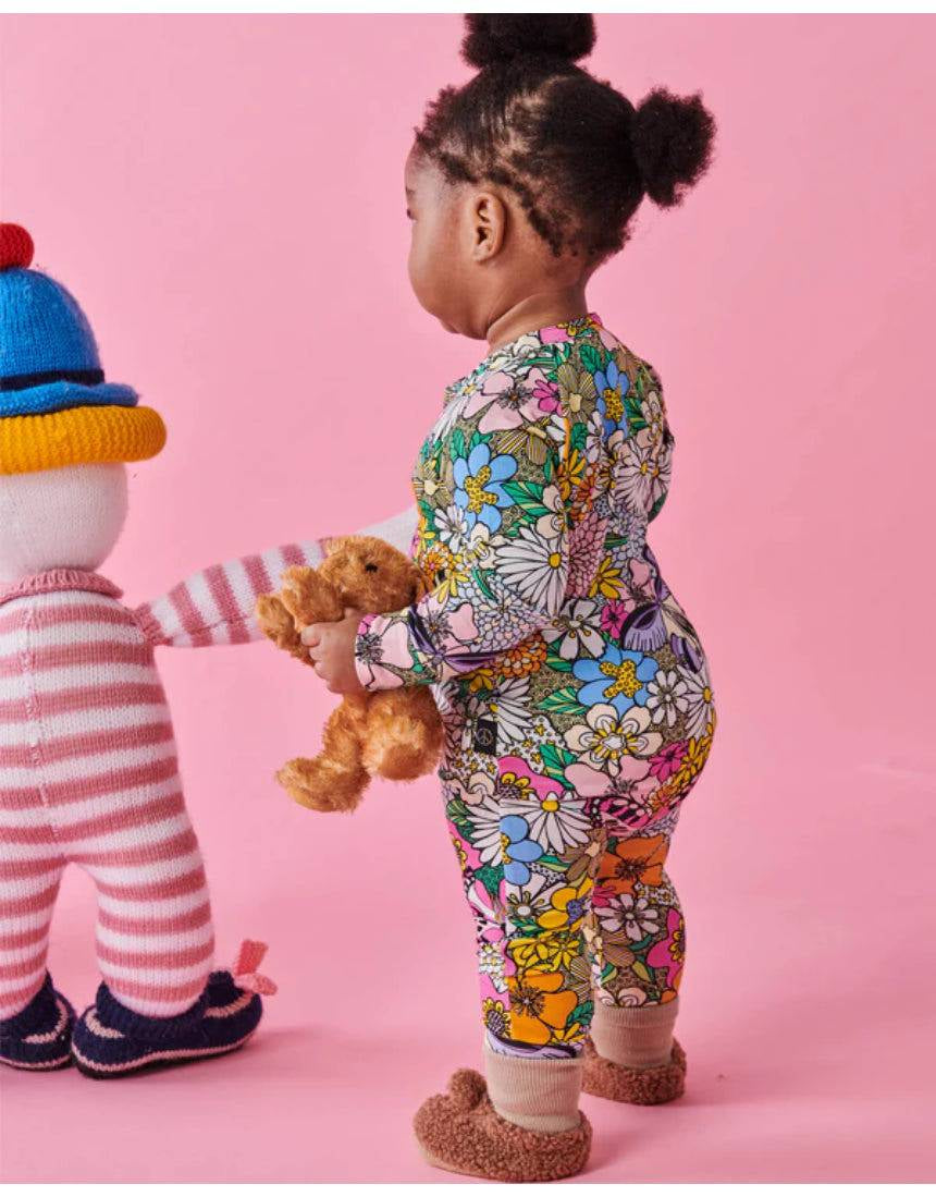 Kip & Co Bliss Floral organic long sleeve zip romper for babies, featuring colorful floral pattern and comfortable design.
