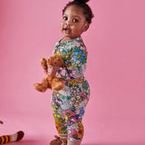 Kip & Co Bliss Floral organic long sleeve zip romper for babies, featuring colorful floral pattern and soft fabric.