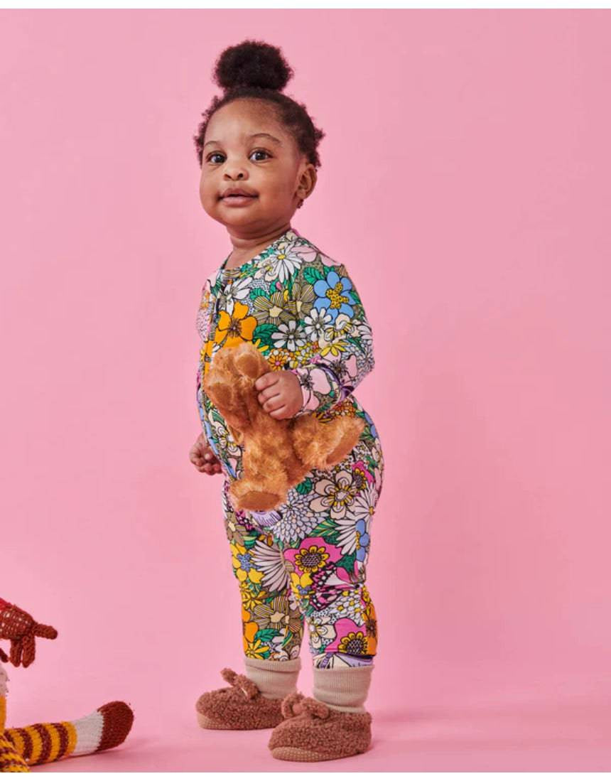 Kip & Co Bliss Floral organic long sleeve zip romper for babies, featuring colorful floral print and soft fabric.