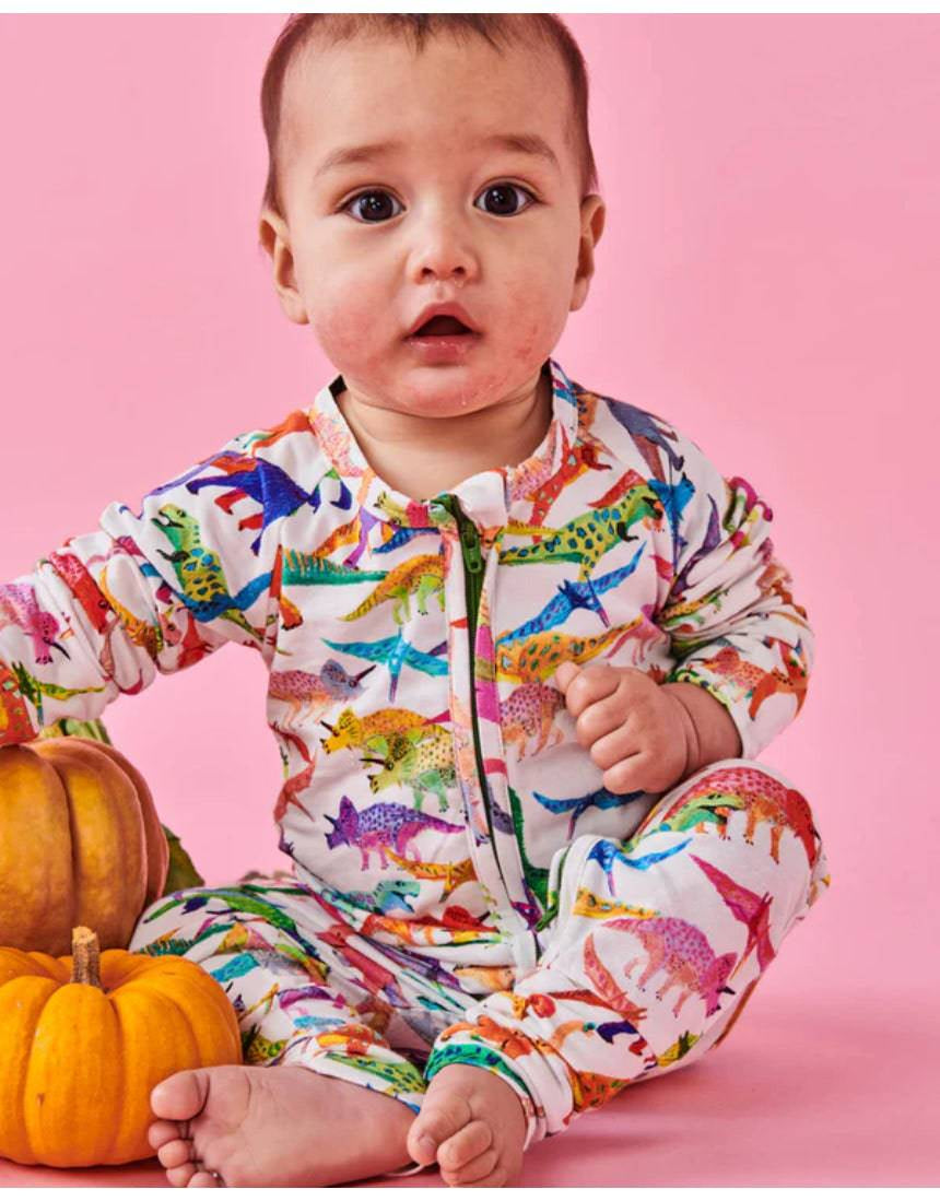 White organic long sleeve Dino Max romper by Kip & Co, featuring a zipper closure and playful dinosaur print for babies.