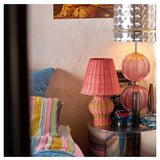 Kip & Co Guava Stripe Le Parisian Rattan Lamp, styled