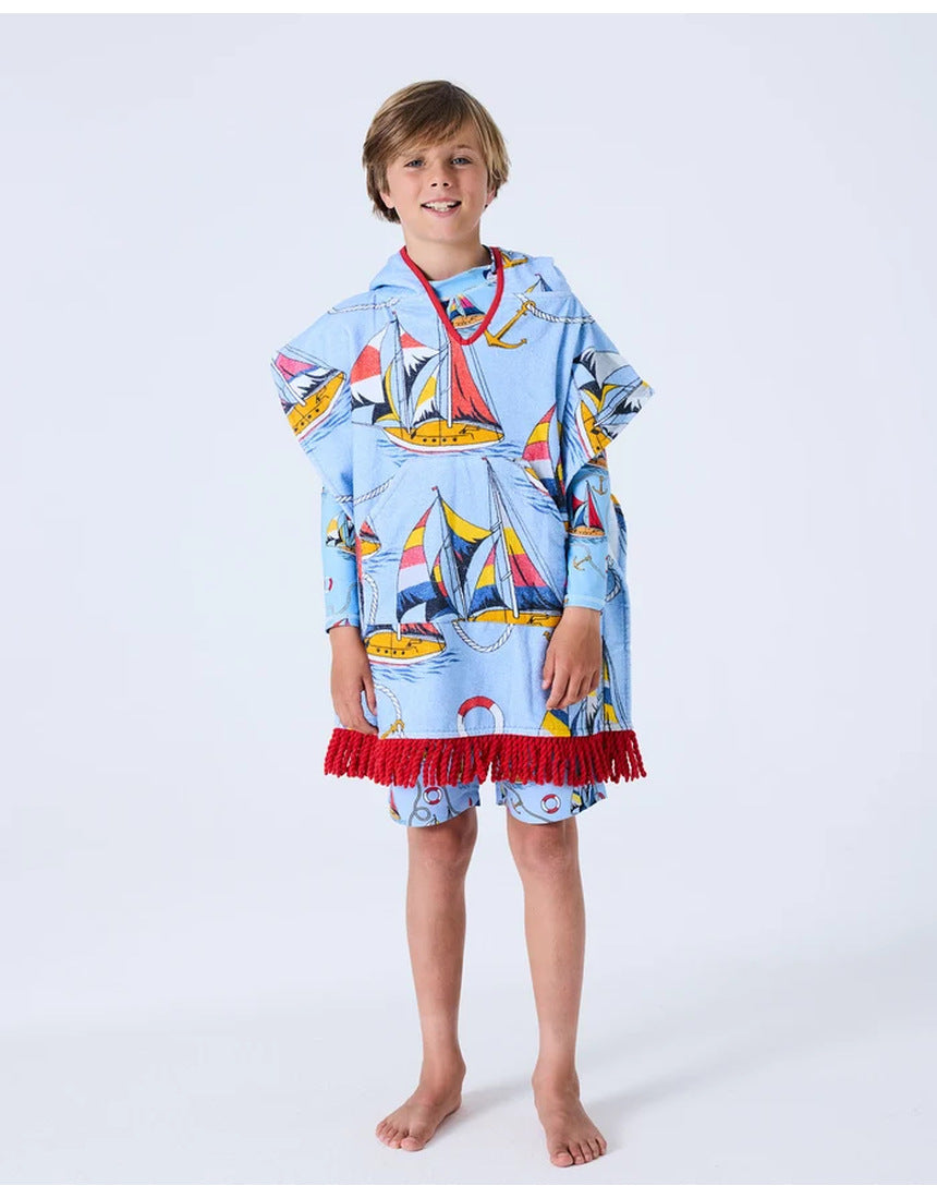 Kip&Co kids' printed terry poncho with nautical Hey Sailor design, featuring soft fabric and colorful sailor-themed pattern.