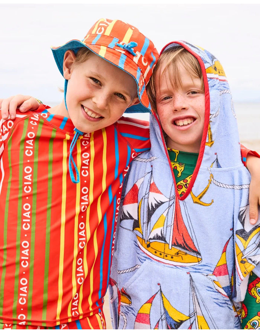 Kip&Co printed kids terry poncho with sailor-themed design, soft terry fabric, and hood for comfortable kids' wear.