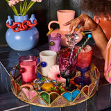 Kip & Co Bon Bon round tray in colorful patterned design for serving snacks and drinks
