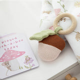 Living Textiles Acorn Teething Ring Rattle from Whimsical Wonderland, soft fabric baby teether with a gentle rattle feature.