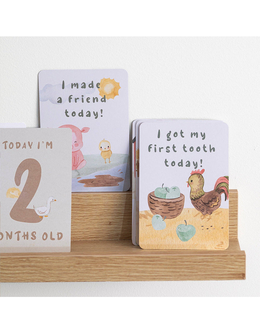 Living Textiles Baby Milestone Cards featuring a tractor ride design, colorful and perfect for capturing baby's special moments.