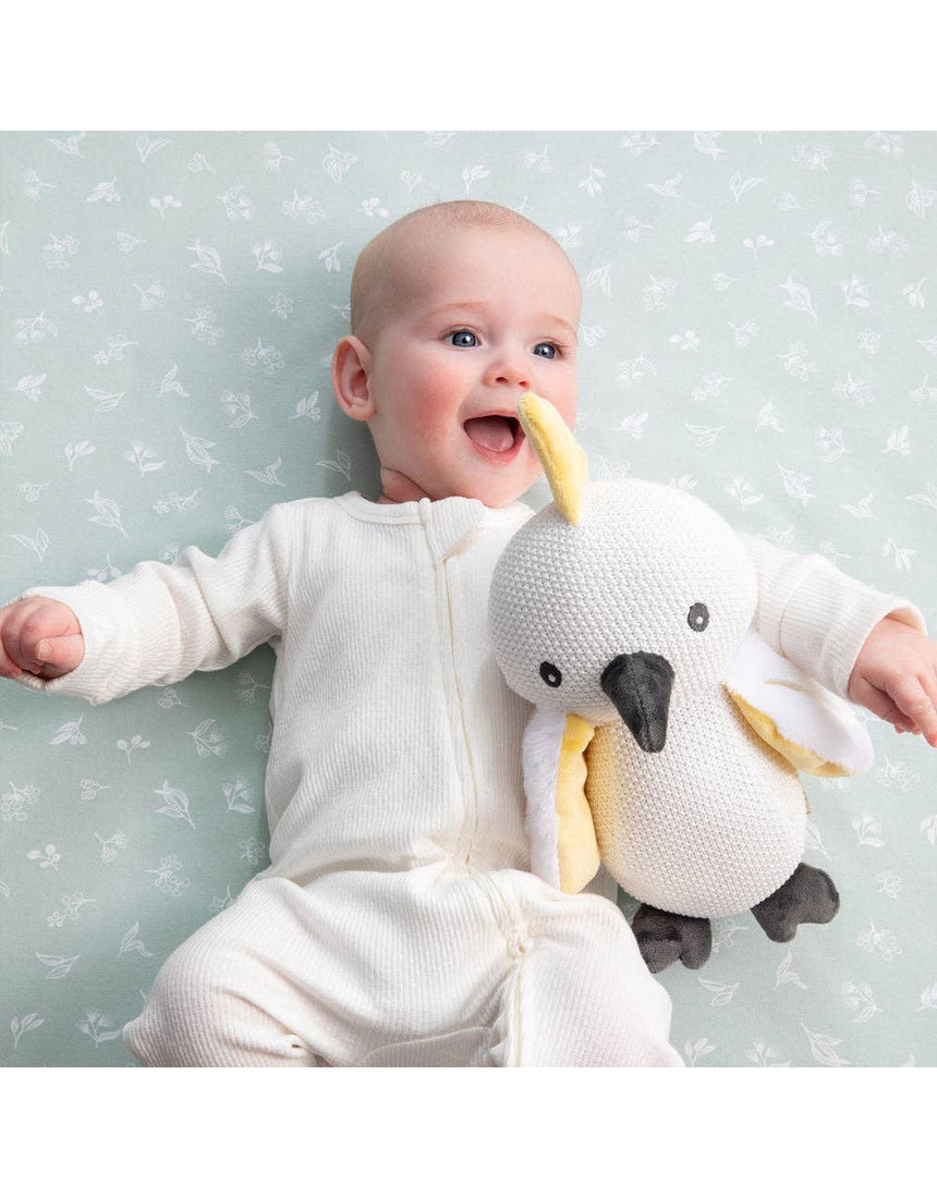 Living Textiles knitted toy Colin the Cockatoo soft toy with detailed feathers and bright colors, perfect for cuddling and play.