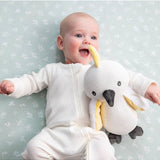 Living Textiles knitted toy Colin the Cockatoo soft toy with detailed feathers and bright colors, perfect for cuddling and play.