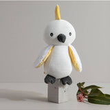 Living Textiles knitted toy Colin the Cockatoo, a soft and cuddly bird-shaped plush toy with detailed features.