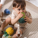 Living Textiles Mini Market Stroller Toys set featuring plush broccoli and tomato, designed for pram entertainment for babies.