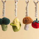 Living Textiles Mini Market Stroller Toys featuring a plush broccoli and tomato for baby entertainment and sensory play.