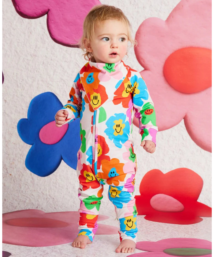 Halcyon Nights Hej Blomma! bib featuring colorful floral design for babies and toddlers.