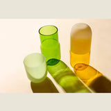 Maho Happi Pill fried egg glassware with avocado design, featuring a clear glass container and colorful decorative elements.