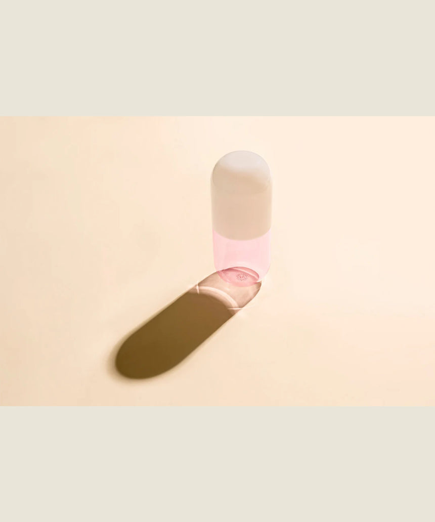 Maho Happi Pill Fairy Floss in a clear glass container with colorful cotton candy inside, showcasing the playful treat.