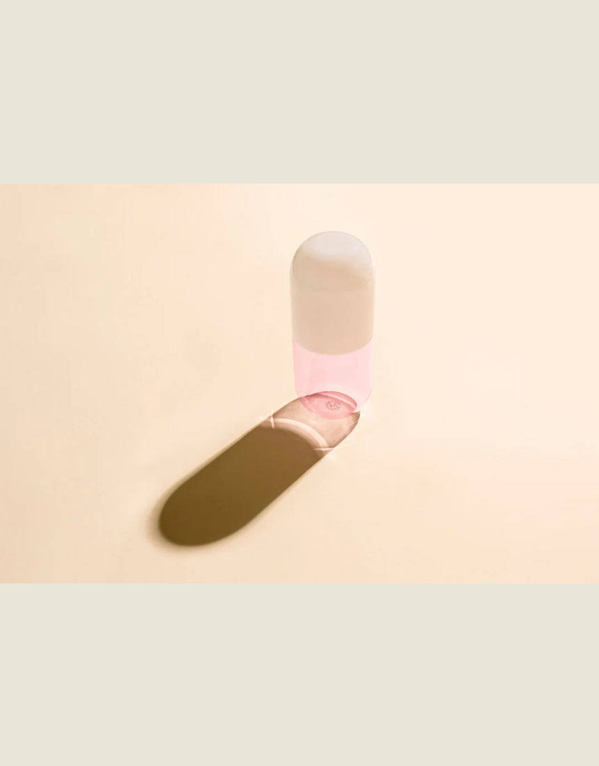 Maho Happi Pill Fairy Floss in a clear glass container with colorful cotton candy inside, showcasing the playful treat.