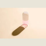 Maho Happi Pill Fairy Floss in a clear glass container with colorful cotton candy inside, showcasing the playful treat.