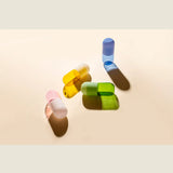 Maho Happi Pill Fairy Floss glassware with colorful, whimsical design in a product group shot.