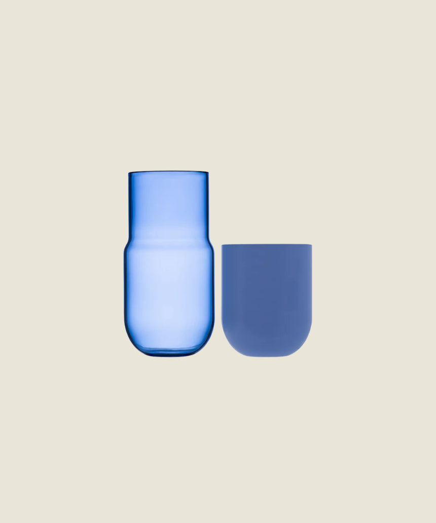 Maho Happi Pill glassware in blue, disassembled showing the colorful pill-shaped design and vibrant blue color.