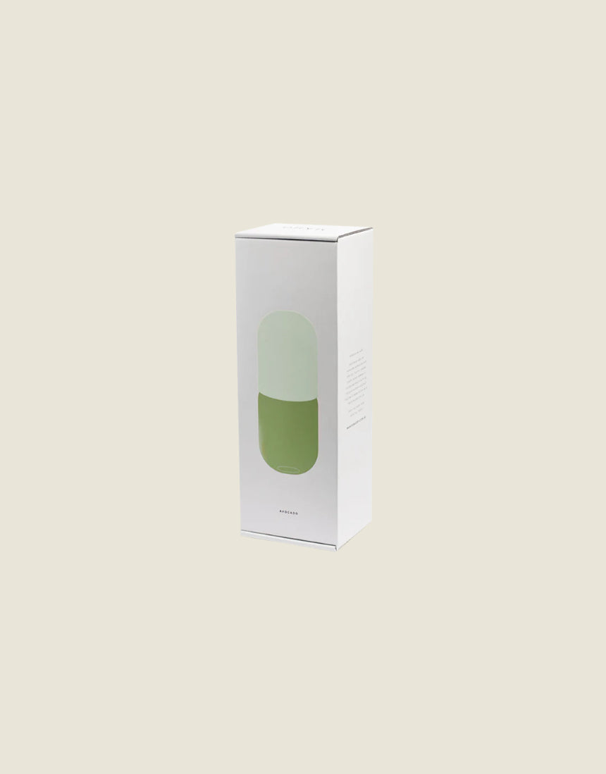 Maho Happi Pill box packaging featuring an avocado design, with the pill container visible in the image.