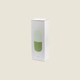 Maho Happi Pill box packaging featuring an avocado design, with the pill container visible in the image.