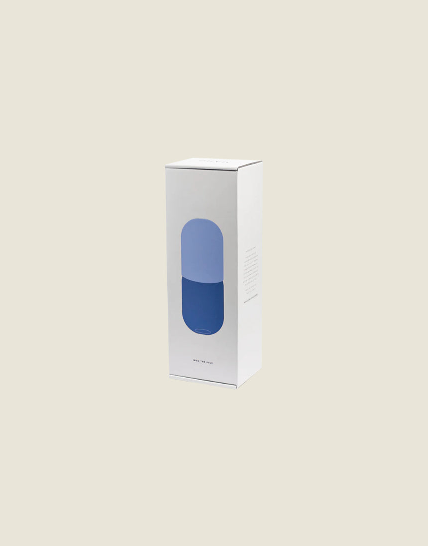 Maho Happi Pill box packaging in blue with branding and product name, featuring a sleek, modern design.