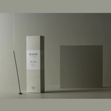 Maho White Musk Incense sticks in a box, with white packaging and scent description visible, designed for aromatic burning.