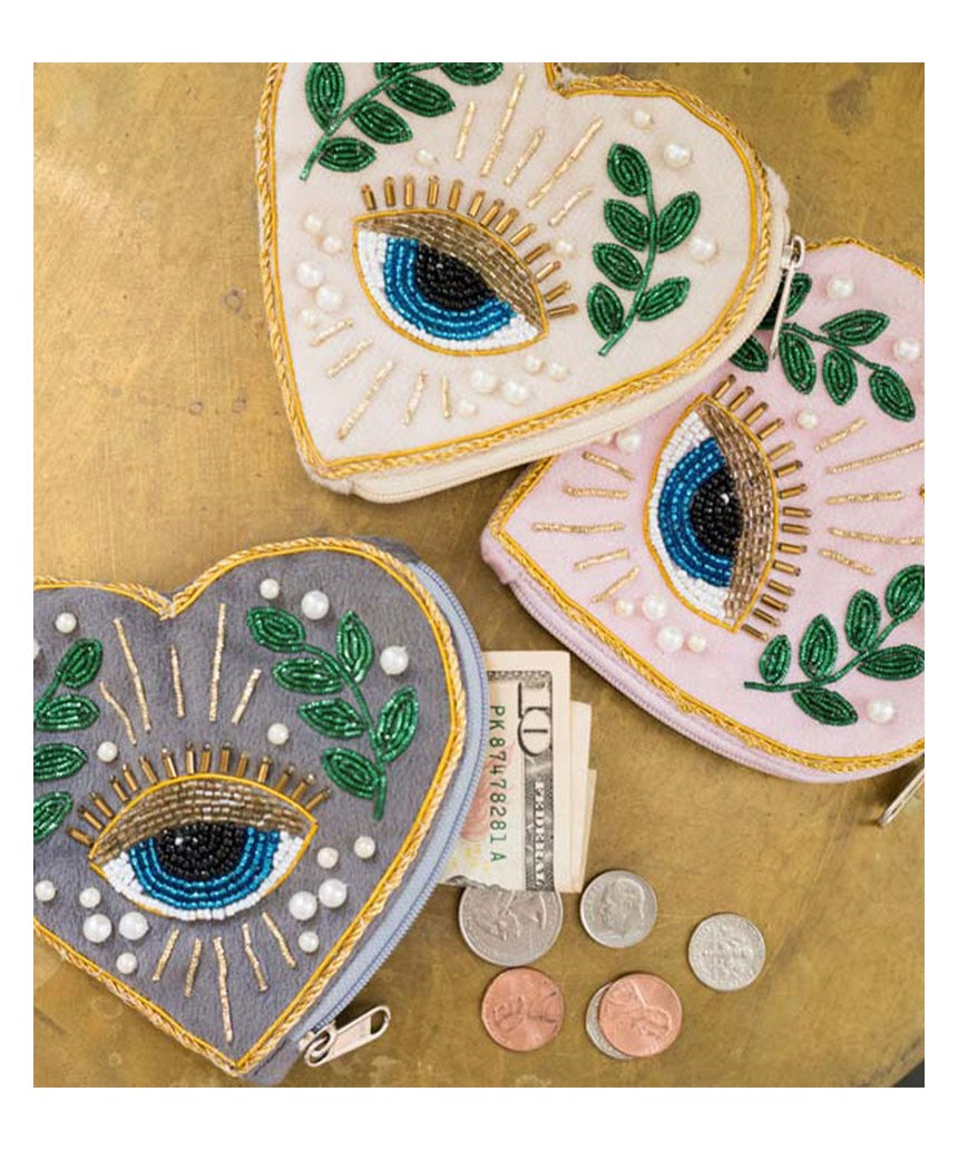 Colorful Matr Boomie Manku beaded heart coin purse with intricate beadwork and compact design, perfect for storing small essentials.
