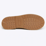 Rust-colored Merry People Bobbi gumboot shoes with a sturdy rubber sole and stylish waterproof design.