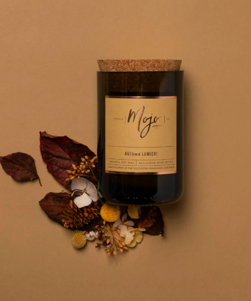 Mojo Candle Co. Autumn Lumiere limited edition candle with warm autumn-inspired wax and elegant design.
