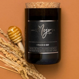 Mojo Candle Co. Tobacco & Hay Black Label candle with black label and rustic wax finish.