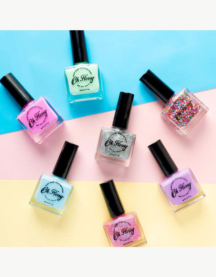 Kids' Oh Flossy nail polish in cream violet, featuring a colorful bottle with playful packaging and a brush applicator.