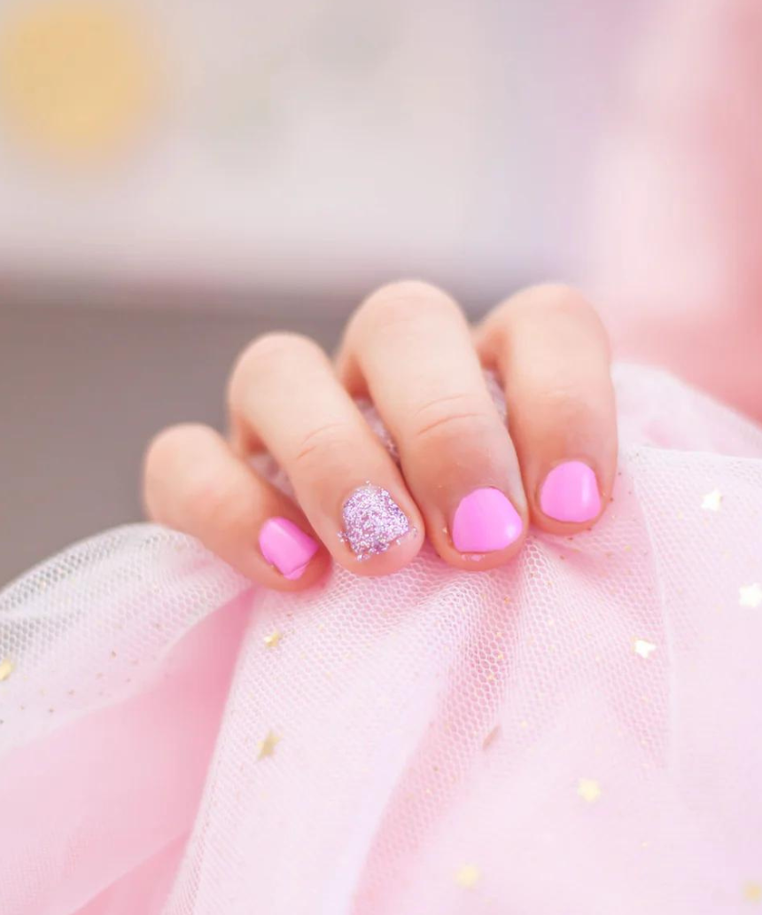 Kids' Oh Flossy nail polish bottle in cream violet with colorful cap, designed for children’s safe, fun nail coloring.